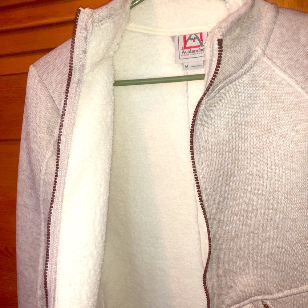 Avalanche wear pile jacket